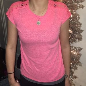 Pink shirt with lace shoulders